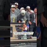 In an adorable moment, Jalen Brunson hands the Bill Russell Trophy to Josh Hartโs son ๐