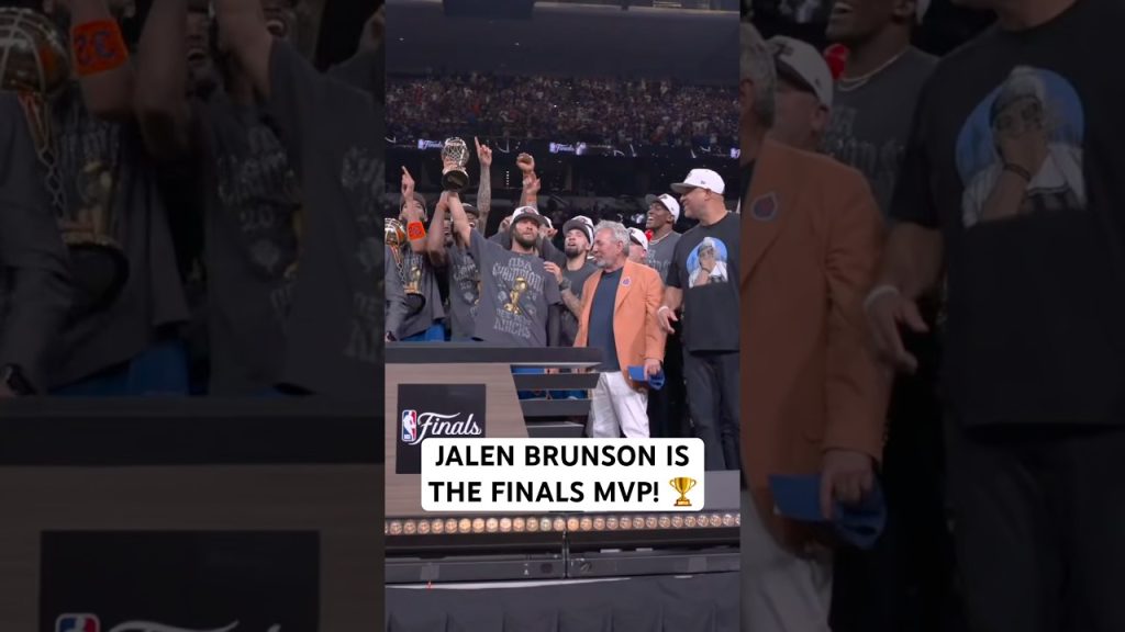 Jalen Brunson is awarded the Bill Russell NBA Finals MVP trophy 🏆