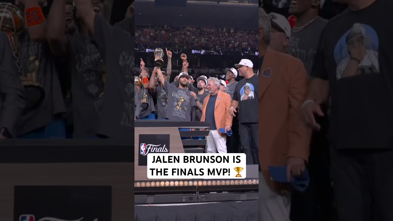 Jalen Brunson is awarded the Bill Russell NBA Finals MVP trophy 🏆