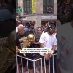 Rick Brunson seen holding the The Larry O’Brien Trophy on the Brunson family float 🤩
