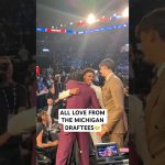 Yaxel Lendeborg & Aday Mara embrace Morez Johnson Jr. after he’s drafted