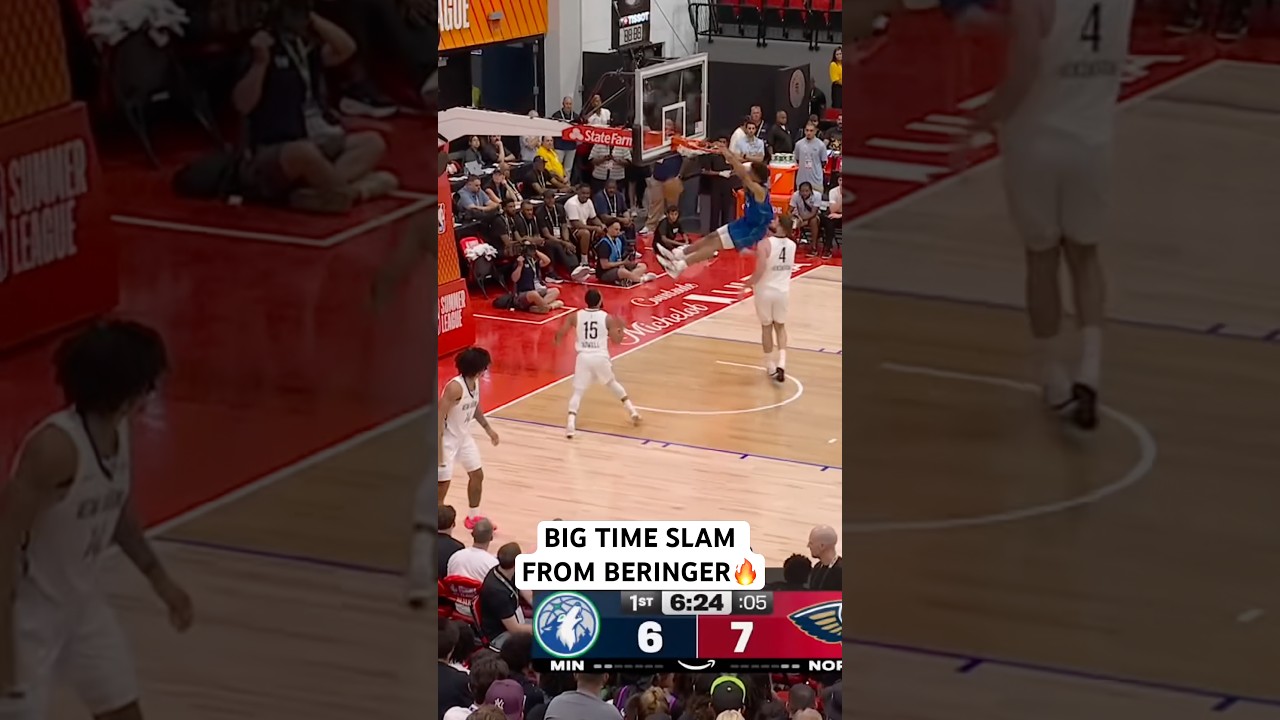 Joan Beringer rocks the rim with the two hand jam off the BLOB lob