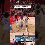Stirtz lobs it up, Mara lays in the alley oop