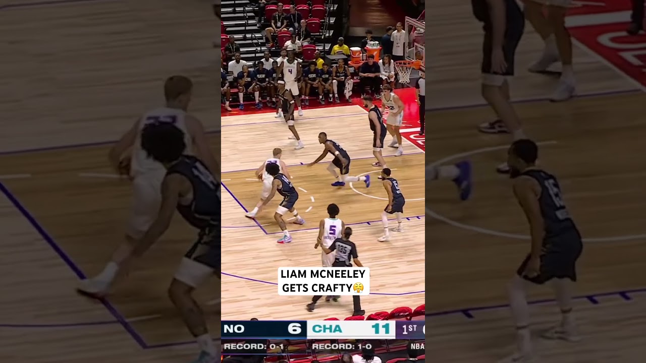 Liam McNeeley shows off the handles and footwork as he gets inisde for the layup