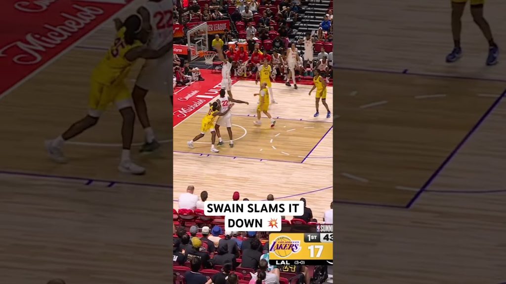 Dailyn Swain weaves through the defense then powers home the two hand jam